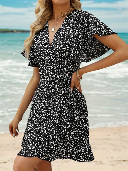 Luchtige Dames Zomerjurk met Bloemenprint en Elegante Overslag Pasvorm