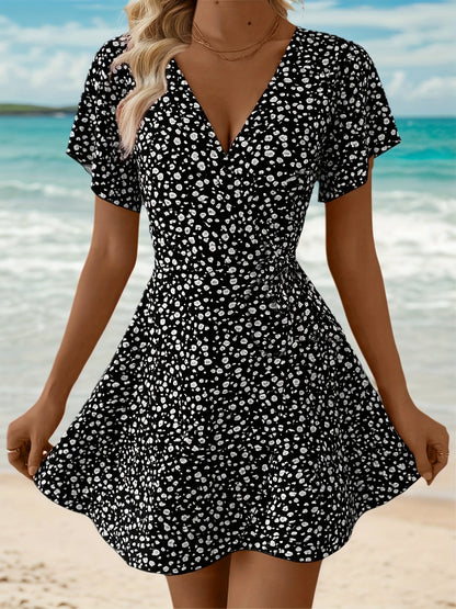 Luchtige Dames Zomerjurk met Bloemenprint en Elegante Overslag Pasvorm