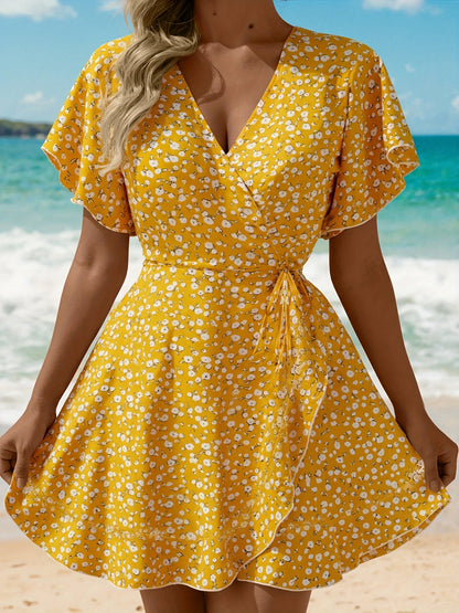 Luchtige Dames Zomerjurk met Bloemenprint en Elegante Overslag Pasvorm