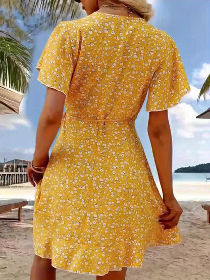 Luchtige Dames Zomerjurk met Bloemenprint en Elegante Overslag Pasvorm