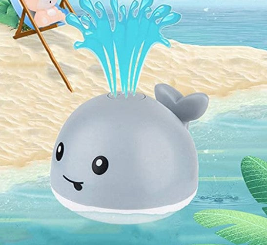 Kind speelt met Matthy Bath Buddie