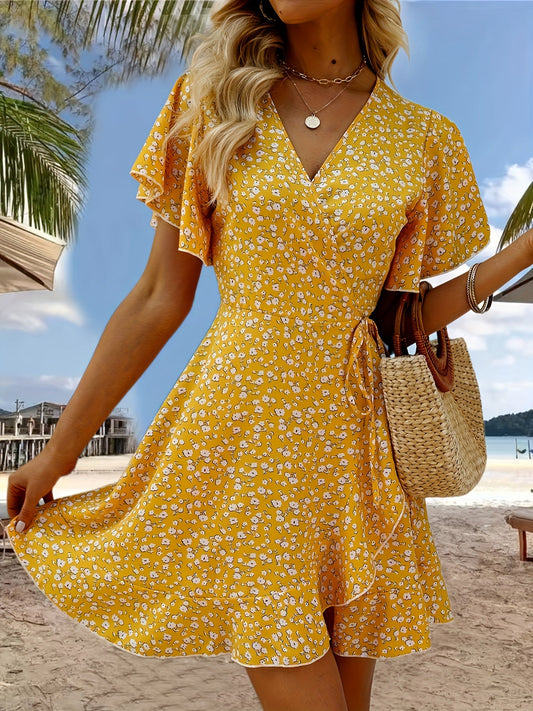 Luchtige Dames Zomerjurk met Bloemenprint en Elegante Overslag Pasvorm