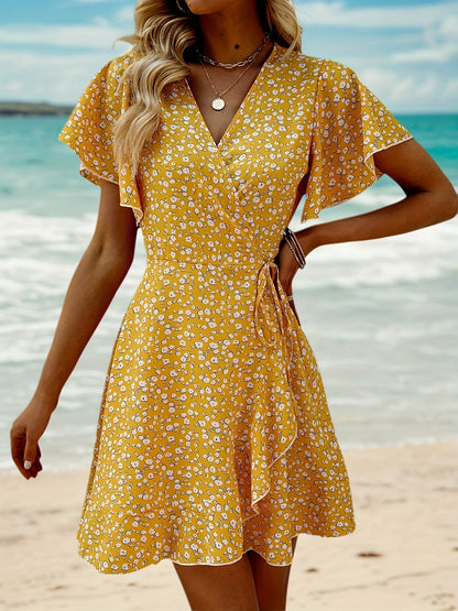 Luchtige Dames Zomerjurk met Bloemenprint en Elegante Overslag Pasvorm